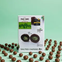 A fun and graphic product shot for chocolate-coated capers. I created a pattern with the product spilling out of the box, resulting in a playful and eye-catching image for social media.