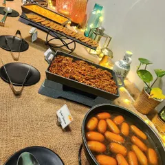 The dessert section of our buffet, featuring sweet gulab jamun and other treats. Every meal should end on a sweet note.