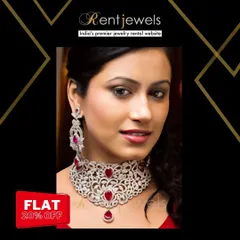 I love this opulent diamond choker with ruby-red stones. It's a perfect fusion of modern sparkle and traditional color, ideal for a bride's reception look.