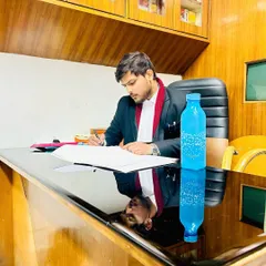 Late nights in the office are part of the process. Here, I am drafting legal documents and preparing case strategies to ensure I am always one step ahead.
