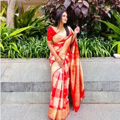 Our client Sowmya glowing with radiance in this stunning red and white pure Banarasi saree. A showstopper saree for a showstopper woman.