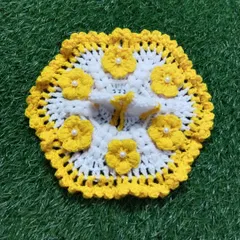 A lovely summer poshak in white and yellow, decorated with six small, hand-crocheted yellow flowers. Each flower is centered with a tiny pearl for a touch of elegance.