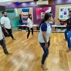 An instructor demonstrates a defensive stance during our women's self-defense workshop. We focus on teaching practical body positioning and awareness to help participants identify and react to threats early.