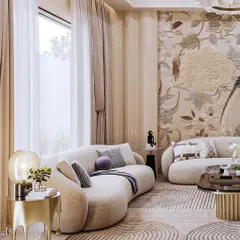 This view of the living room showcases the harmony between the sculptural furniture and the soft, natural light filtering through sheer curtains. The focus is on creating a serene and inviting atmosphere.