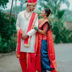 A candid moment of love and admiration between the couple. The bride's gentle touch and the way they look at each other tells a story of deep connection.