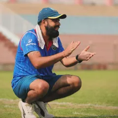 11 years and counting. Our head coach on the sidelines, orchestrating another victory. Pure passion on display.