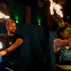 Another shot from our duo fire performance. We use a variety of props, including these fire crowns, to create a unique and visually interesting show.