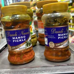 A close look at our classic homemade Mango Pickle. You can see the rich texture and spices that we use, made from a traditional family recipe.