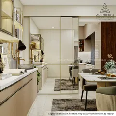 A look from the crockery unit towards the dining area, showing how a glass partition can define spaces without closing them off. This maintains an open, airy feel while creating distinct zones.