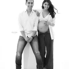 A relaxed and happy couple's portrait in black and white. Removing the color puts the focus entirely on their joyful expressions and easy connection.