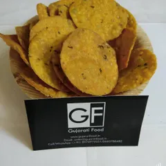 These are my crispy Methi Puri, a savory fried bread flavored with fenugreek leaves. They are a perfect dry snack to keep in your pantry for guests or for a quick bite.