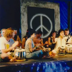 Conducting a music workshop on stage at Woodstock. The theme was peace, and it was incredible to connect with so many people through the universal language of rhythm.