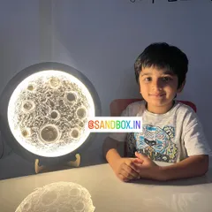 Another happy little astronaut with the moon he created all by himself. It’s amazing to see the focus and creativity that goes into each lamp, and the final glowing result is always a big reward.