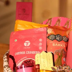 Another detail shot of the Diwali hamper, focusing on the gourmet treats from Frutox and Bombay Sweet Shop.