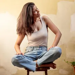 A relaxed, smiling pose in a simple, everyday outfit. This shows my ability to model for casual wear and lifestyle brands.