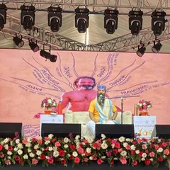 Speaking at a large yoga conference. The backdrop illustrates the eight limbs of yoga, the complete path of which asana is just one part. Sharing this deeper knowledge is my passion.