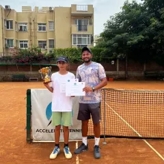 The winner of our academy's Under-14 Singles open tournament. Hosting these events gives my players valuable match experience in a familiar setting.