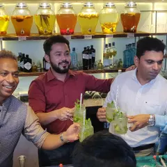 Cheers to a successful workshop. The final and most important step is always enjoying the delicious cocktails you've learned to create together.