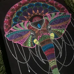 A majestic elephant adorned with intricate mandala and zentangle patterns. This piece combines the strength of the elephant with the spiritual balance of the mandala.