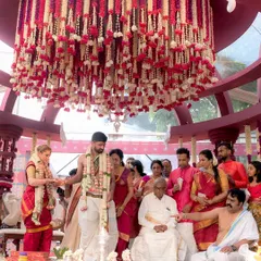 During the wedding ceremony, the groom's attire needs to be both respectful and functional. This Iyer groom's veshti is draped to ensure comfort and adherence to tradition.