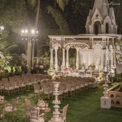 The wedding mandap at Birla House, illuminated against the night sky, creating a grand yet intimate setting for the ceremony.