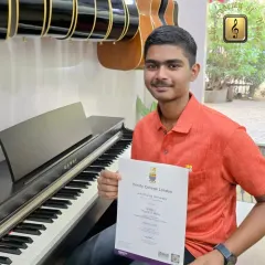 A round of applause for our amazing student, John Fernandes. We're thrilled to announce his outstanding achievement of 96% in the Trinity College London Grade 3 Theory of Music exams.