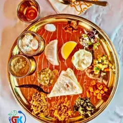 Elegant Thali Presentation: For a different style of service, we also offer our authentic South Indian meals in an elegant brass thali. It provides a royal touch to the dining experience.