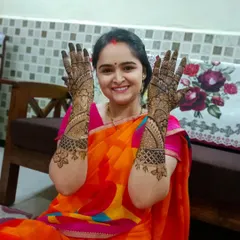A happy client showing off her beautiful, full-hand mehndi. Her smile says it all. I love creating designs that bring so much joy to people during festive times.