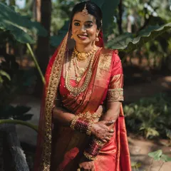 A full portrait of Dishaa in her 'Madime' look, looking radiant and celebrating her culture.