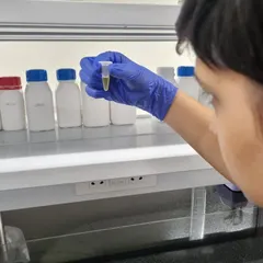 A close-up of Pavitra engaged in a scientific experiment. The concentration and precision he learned through our program are transferable skills that benefit him in every academic pursuit.