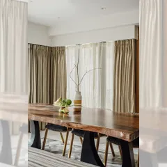 A close-up of the live edge dining table, showing the natural grain and texture of the wood. Each slab is unique, so every table I make is one-of-a-kind.