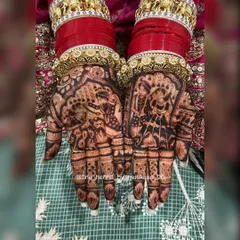 The magic is in the stain. This is the result of my all natural henna paste after it develops, a deep, rich maroon that looks stunning with the traditional bridal chura. Mashallah, what a colour.