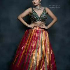 This vibrant lehenga look is perfect for a Sangeet or reception. I demonstrate how to create a glamorous, photo-ready look with bold eyes and glowing skin that lasts through a night of celebration, a key technique taught in my pro course.
