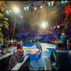 Event coverage is about capturing the atmosphere. Here, I framed the shot to show not just the performer but the massive, engaged crowd and the scale of the Red Bull BC One production.