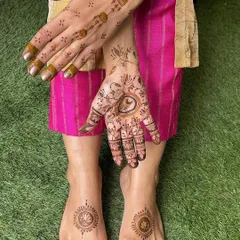 A different angle of the Yin-Yang design, showing how it sits beautifully in the palm. The feet feature simple lotus mandalas for a coordinated feel.