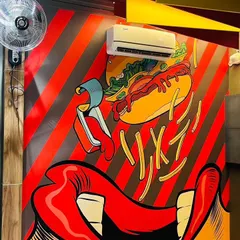 This fun and energetic pop-art mural is perfect for a fast-food restaurant or cafe. The bold colors and graphic design create a playful atmosphere that matches the brand's identity.