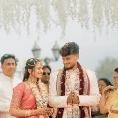 The moment right before the Varmala exchange, filled with anticipation and loving gazes.