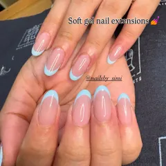 The most trending summer colors for French nails! Here are examples of icy blue and butter yellow tips for a fun, seasonal twist.