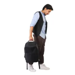 A male model holding a black backpack. On-model shots for accessories like bags help customers understand the product's size and how it's carried.