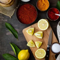 The simple, pure ingredients for our lemon pickle: fresh lemons, red chilli powder, turmeric, and salt. No preservatives, no artificial flavours.