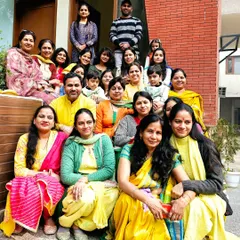 A large group photo of our 'yog parivar' celebrating Basant Panchami. The joy and sense of belonging are what make our community special.