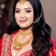 A beautiful portfolio shoot from my professional batch. This student created a classic red and gold bridal look with a soft smokey eye.