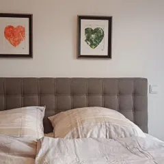 Another view of this lovely bedroom setup. Seeing my art become part of someone's personal sanctuary is incredibly rewarding. It shows how art can complete a room's decor.