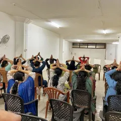 Our on-site sessions are practical and designed for the workplace. Here, we guide employees through desk yoga routines that can be done in office attire to alleviate physical strain, improve posture, and restore focus during the workday.