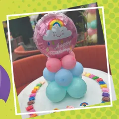 Details from a Monsoon-themed birthday, featuring a cute rainbow balloon centerpiece and colorful clay packs ready for the kids. We take care of all the little details, including decor and art supplies.