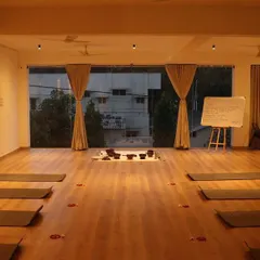 Another view of our studio, ready to welcome students. The open space and large windows create a connection to the outdoors, even while you are inside.