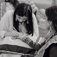Lost in the art, found in the moment. A candid black and white shot of me completely focused on creating a beautiful design for a client.