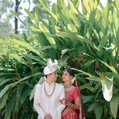The source of inspiration. This original wedding photograph provided all the essential details, from the intricate traditional outfits to the soft, happy expressions that I carefully recreated in the final artwork.