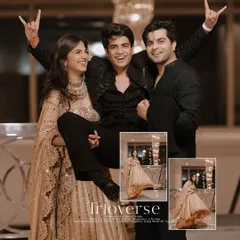 Weddings are about celebrating with your closest friends. This fun, informal shot of the couple with their "trio" captures the joy and energy of the celebration.