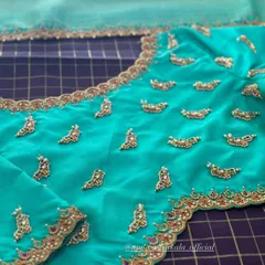The back of the turquoise buti blouse.